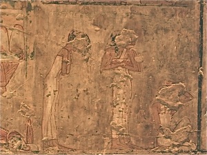 Mourners using various gestures and dishevel their hair