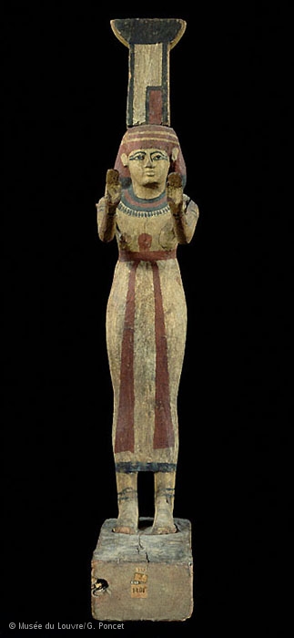 A statuette of Nephthys with Her name glyph, showing the neb basket and the temple "blueprint"