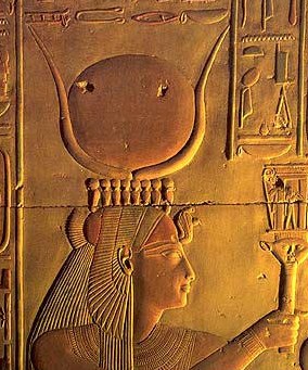 Isis from Abydos wearing a uraeus crown (upholding the horns and disk) and a holy cobra upon Her brow
