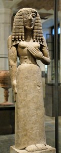 An early Greek Kore, looking very Egyptian, complete with braided wig
