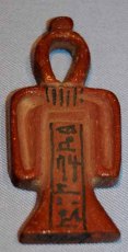 A classic Blood of Isis amulet, with the name of the deceased inscribed thereon