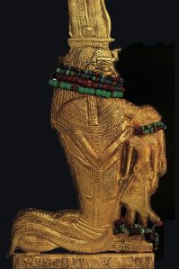 The human-headed Cobra Goddess Werethekau nursing Tutankhamum