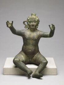 A Roman-era Harpokrates, apparently wanting Mom to pick Him up